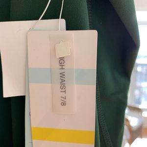 Green Zella high waist 7/8 yoga leggings. Side pockets. NWT. Size XXL.